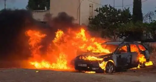 Israeli settlers rampage through West Bank village; three Palestinians killed by IDF fire